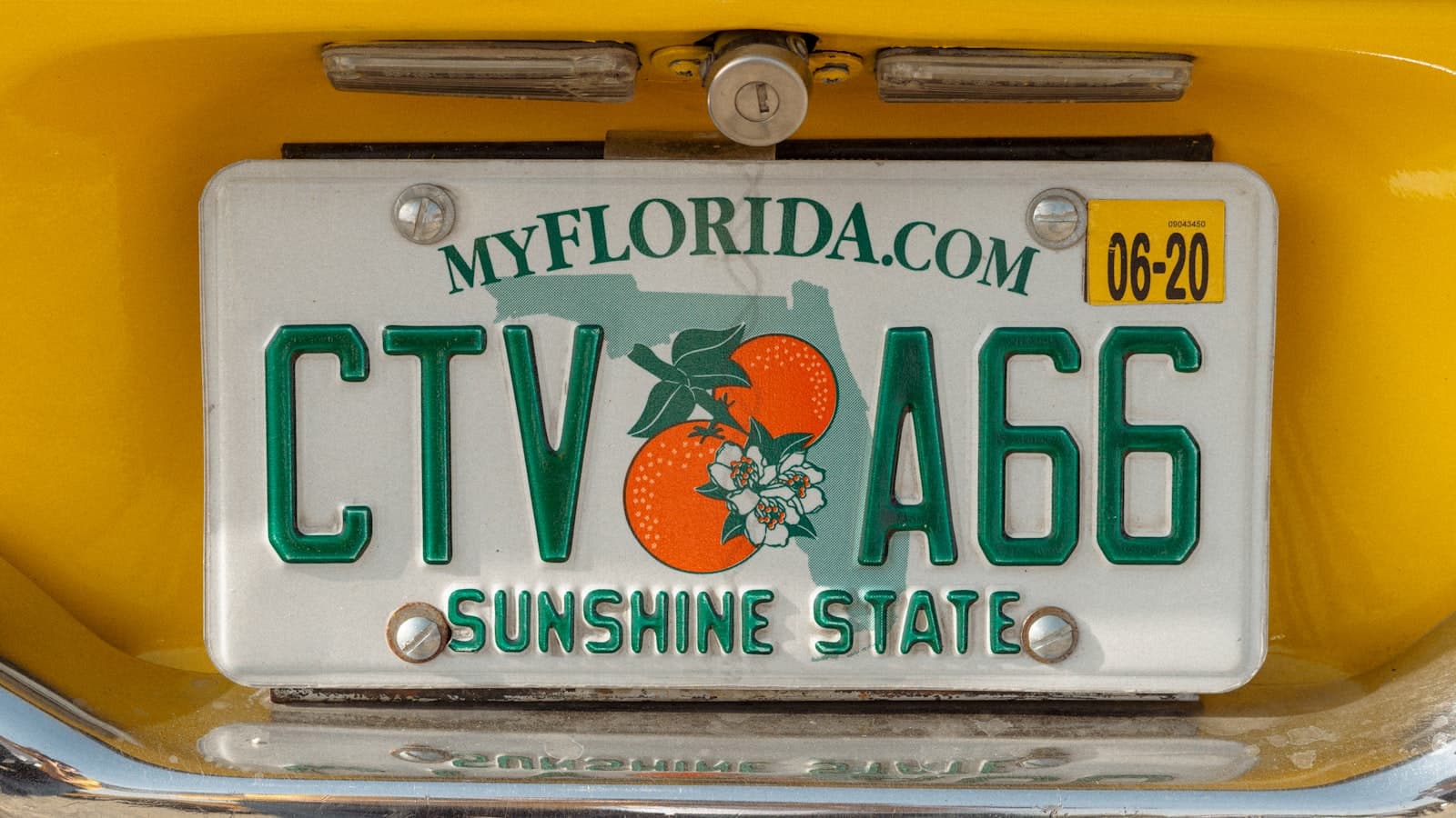 Florida license plate on a yellow car